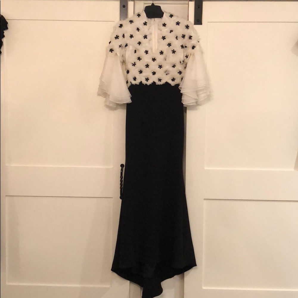 Floral appliqué bell sleeve gown